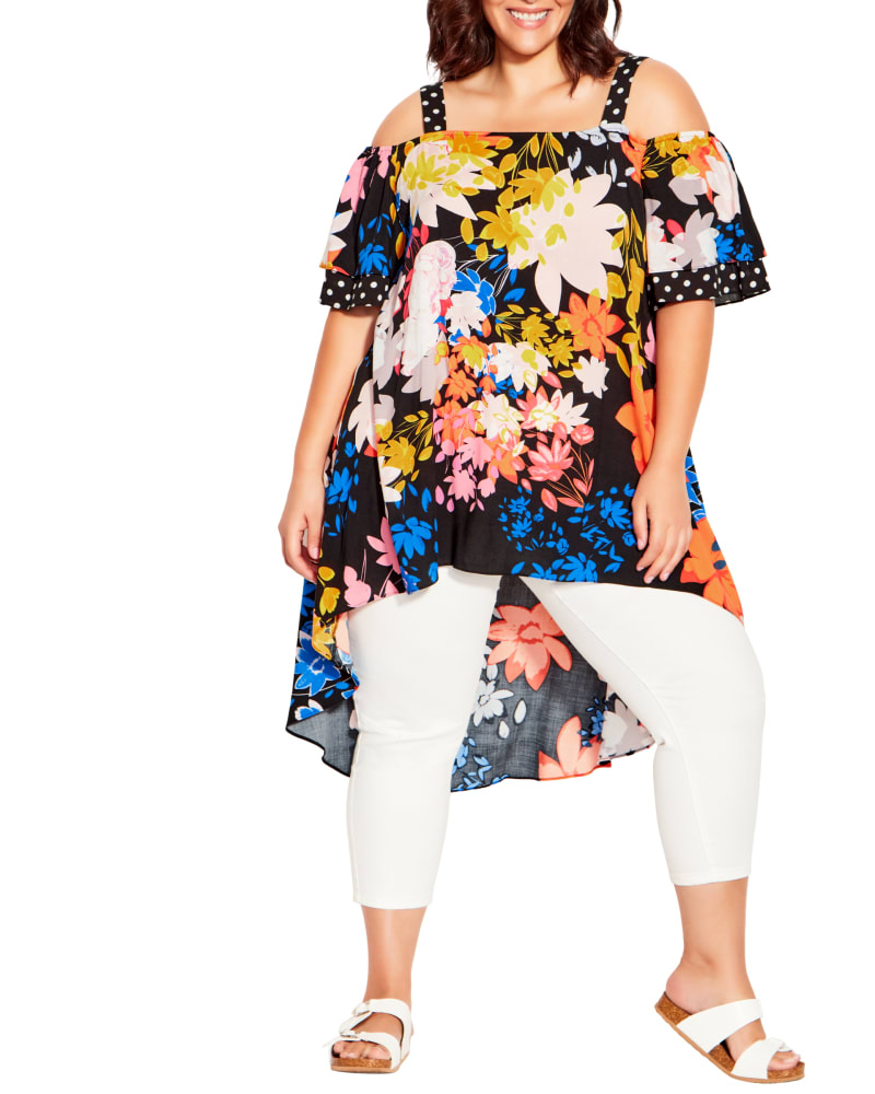 Plus size model wearing Lyra Wonderland Cold Shoulder Tunic by Avenue | Dia&Co | dia_product_style_image_id:191569